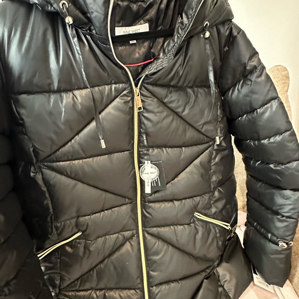 Nine West Black Puffer Jacket with hood and gold details in zippers, pockets